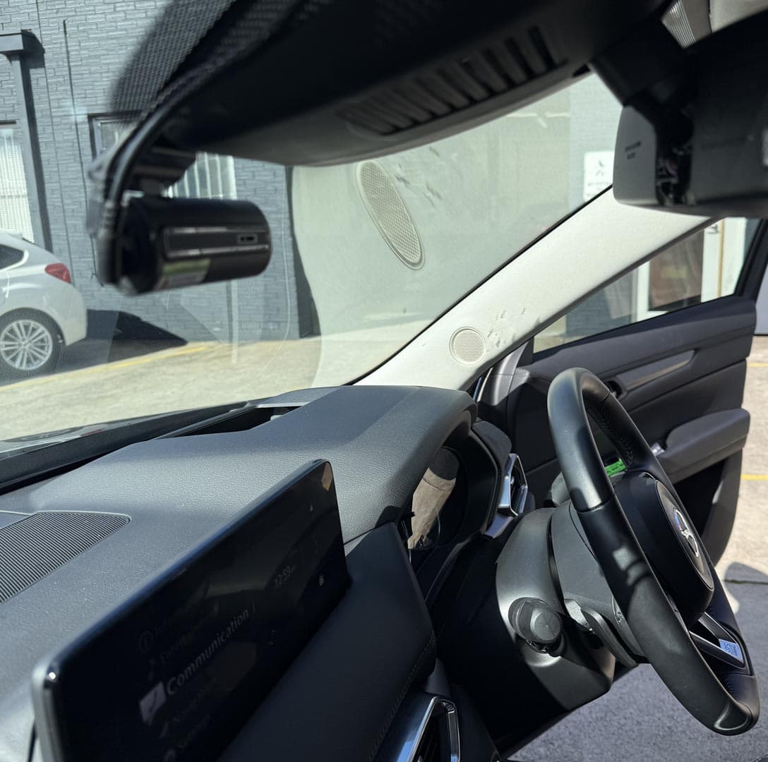 4K front dash cam mounted near rear view mirror